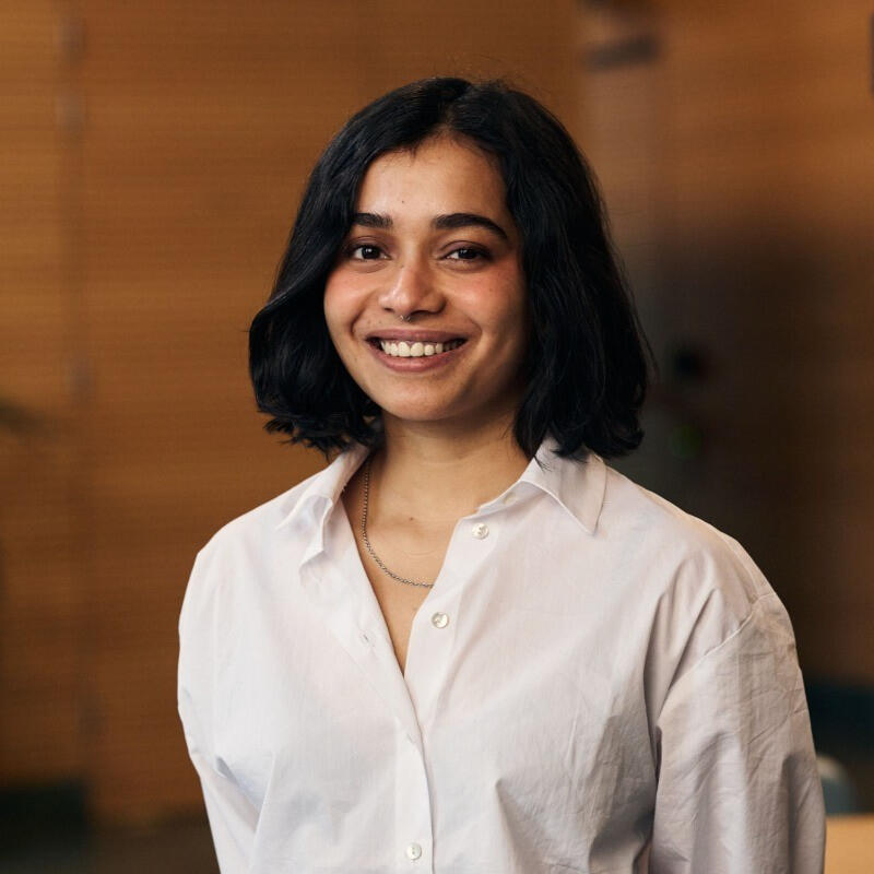 A portrait of Apoorva Savant - a Senior Product Designer at Adyen - she used to be a Design Researcher at the IIT Bombay Industrial Design Centre School of Design and has worked on UX Design at Paytm Insider and Speakap.